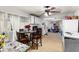 Eat-in kitchen featuring a ceiling fan, dining table, and white cabinets at 1054 Hillcrest Se Dr, Atlanta, GA 30316