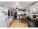 Bright kitchen with white cabinets, ceiling fan, and a dining area, great for gatherings at 1054 Hillcrest Se Dr, Atlanta, GA 30316