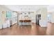 Bright kitchen featuring a large island, modern appliances, and sleek white cabinetry at 1087 Halletts Peak Pl, Lawrenceville, GA 30044
