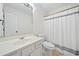 Bathroom featuring a toilet, vanity, and shower at 172 Stoneforest Dr, Woodstock, GA 30189