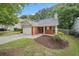 Beautiful brick home with a two car garage and well maintained landscaping at 172 Stoneforest Dr, Woodstock, GA 30189