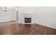 Spacious living room with laminate flooring and a cozy fireplace at 172 Stoneforest Dr, Woodstock, GA 30189