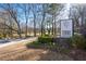 A well-manicured entrance sign for 'Towns at North Decatur' welcomes visitors into the community at 852 Constellation Dr, Decatur, GA 30033