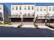 Townhome exterior showcasing garages and private decks at 852 Constellation Dr, Decatur, GA 30033