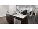 Modern kitchen with an island, stainless steel appliances, and a stylish open-concept layout at 852 Constellation Dr, Decatur, GA 30033