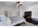 A well-lit bedroom with a ceiling fan and neutral decor offers a peaceful retreat at 852 Constellation Dr, Decatur, GA 30033
