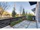A private patio area, featuring stone pavers and a fence, adds an outdoor living space at 852 Constellation Dr, Decatur, GA 30033