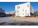 A view of the community street, lined with modern townhomes, showcases a well-planned neighborhood at 852 Constellation Dr, Decatur, GA 30033
