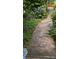 Garden path leads to outdoor living spaces and lush landscaping at 3260 Governors Court Ct, Duluth, GA 30096