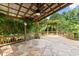 Backyard with multilevel patio and wooded lot at 3260 Governors Court Ct, Duluth, GA 30096