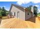 Backyard featuring a deck off the house, with green hills and trees around the property at 3260 Governors Court Ct, Duluth, GA 30096