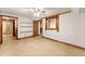 Partially finished basement with tiled floors, a window with trim and a partial bath area at 3260 Governors Court Ct, Duluth, GA 30096