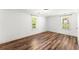 Bright, airy bedroom with new floors, windows, and white trim at 3260 Governors Court Ct, Duluth, GA 30096