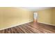 Bedroom showcasing hardwood floors and a window with natural light at 3260 Governors Court Ct, Duluth, GA 30096