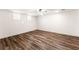 Neutral bedroom offers new floors, lighting, and two windows at 3260 Governors Court Ct, Duluth, GA 30096