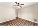 Bedroom featuring modern ceiling fan, vinyl wood floors and a closet at 3260 Governors Court Ct, Duluth, GA 30096
