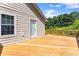Exterior view of a wood deck and access door of the home at 3260 Governors Court Ct, Duluth, GA 30096