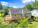 Rear exterior of the home with a spacious deck and well-maintained yard at 3260 Governors Court Ct, Duluth, GA 30096
