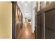 Inviting foyer with hardwood floors, barn doors, and a view of the living room at 3260 Governors Court Ct, Duluth, GA 30096