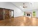 Bright living room with hardwood floors, fireplace, skylights and barn door at 3260 Governors Court Ct, Duluth, GA 30096
