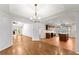 Open-concept layout that connects the dining area with the kitchen area at 3260 Governors Court Ct, Duluth, GA 30096
