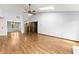 Spacious open concept living room with hardwood floors and sliding barn doors at 3260 Governors Court Ct, Duluth, GA 30096