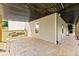 Covered brick patio area with a glimpse of the backyard at 3260 Governors Court Ct, Duluth, GA 30096