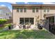 Spacious backyard featuring a patio perfect for outdoor seating and entertaining at 109 Bellehaven Dr, Woodstock, GA 30188