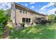 Relaxing backyard area with a cozy patio and well-maintained lawn at 109 Bellehaven Dr, Woodstock, GA 30188
