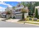 Charming townhouse with a well-kept lawn and a two-car garage at 109 Bellehaven Dr, Woodstock, GA 30188