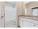 Well-maintained bathroom with a single vanity, and a shower-tub combination at 2058 Glenview Park Cir, Duluth, GA 30097