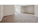 Expansive bonus room with neutral carpet and a cozy nook, perfect for a game room at 2058 Glenview Park Cir, Duluth, GA 30097