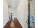 Welcoming entryway featuring hardwood floors and views of staircase and other rooms at 2058 Glenview Park Cir, Duluth, GA 30097