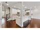 Modern kitchen featuring white cabinets, stainless steel appliances, and a spacious island at 2058 Glenview Park Cir, Duluth, GA 30097