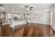 Spacious living room with open access to kitchen featuring hardwood floors and recessed lighting at 2058 Glenview Park Cir, Duluth, GA 30097