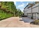 Long driveway leads to a multi-car garage, offering ample parking space at 7125 Heard Rd, Cumming, GA 30041