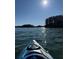 Kayaking on a sparkling lake surrounded by trees, perfect for a relaxing day on the water at 7125 Heard Rd, Cumming, GA 30041