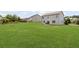 Sprawling backyard providing plenty of room for outdoor activities at 8553 Braylen Manor Dr, Douglasville, GA 30134