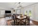Dining area connects the living room with a cozy fireplace to the kitchen at 8553 Braylen Manor Dr, Douglasville, GA 30134
