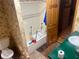 Bathroom with a bathtub, sink, toilet and floral wallpaper at 245 Jesse Mccollum Dr, Canton, GA 30114