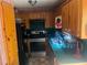 Functional kitchen featuring wooden cabinets and black appliances, ready for your personal touch at 245 Jesse Mccollum Dr, Canton, GA 30114
