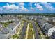 Aerial view of a well-planned community with manicured lawns and inviting neighborhood streets at 579 Brashy St, Woodstock, GA 30188