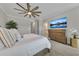 Cozy bedroom with a large bed, decorative accents, and serene ambiance at 579 Brashy St, Woodstock, GA 30188