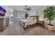 Spacious bedroom with neutral tones, ceiling fan, and great natural light at 579 Brashy St, Woodstock, GA 30188
