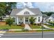 Charming clubhouse exterior with meticulous landscaping and inviting entrance at 579 Brashy St, Woodstock, GA 30188