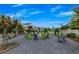Community firepit featuring Adirondack chairs and a wood storage area, perfect for gatherings at 579 Brashy St, Woodstock, GA 30188