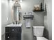 Cozy bathroom featuring modern fixtures, sleek vanity, and a toilet at 285 Jade Cove Dr, Roswell, GA 30075