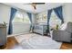 Charming Bedroom room with a crib, glider, and natural light at 285 Jade Cove Dr, Roswell, GA 30075