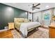 Inviting bedroom with a ceiling fan, and stylish decor at 285 Jade Cove Dr, Roswell, GA 30075