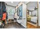 Spacious walk-in closet with built-in shelving and access to main bedroom at 285 Jade Cove Dr, Roswell, GA 30075